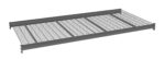 A gray metal grated shelf with a rectangular frame, designed for storage or industrial use. The grid-like surface allows for ventilation and drainage.