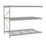 Three-tier industrial storage rack with metal wire and solid shelves. The rack is light gray and sturdy, suitable for warehouses. The design includes vertical support beams and a simple, open framework.