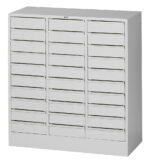 A gray, metal multi-drawer storage cabinet with three columns and eight rows of flat drawers. Each drawer has a rectangular handle and no visible labels, designed for organizing small items.