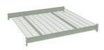 A gray metal wire shelf with a grid pattern is displayed. It has vertical attachment panels on each side, suggesting it is designed for installation in a shelving or storage system. The perspective is angled slightly from above.
