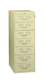 A beige six-drawer filing cabinet with metal handles on each drawer. The top drawer has a label holder and a lock, while the rest have only label holders. The cabinet is standing upright against a plain white background.