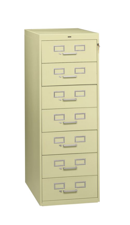 A beige six-drawer filing cabinet with metal handles on each drawer. The top drawer has a label holder and a lock, while the rest have only label holders. The cabinet is standing upright against a plain white background.