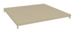 Beige metal shelf with small evenly spaced holes along the edges, situated against a plain white background.