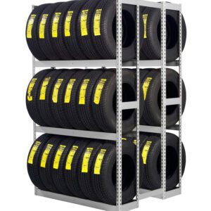 A metal rack displaying three rows of tires, each with a yellow label. There are two sections, each holding ten tires. The tires are stacked neatly, showcasing their tread patterns. The background is white.