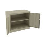 A metal storage cabinet with a beige finish, featuring two doors opened outward. Inside, there are two shelves. The cabinet is simple and unadorned, suitable for office or workshop storage.