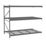 A three-tier metal storage rack with a grid bottom shelf and solid upper shelves. The frame is supported by a vertical strut on the left side. The structure is gray, suitable for industrial or garage use.