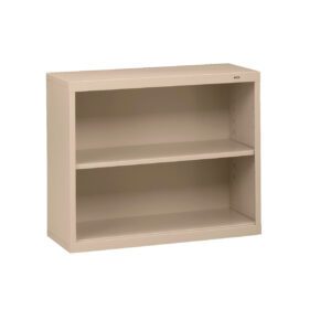A beige metal bookcase with two shelves and a simple, rectangular design. The shelves are adjustable, allowing for flexible storage options. The bookcase is placed against a plain white background.