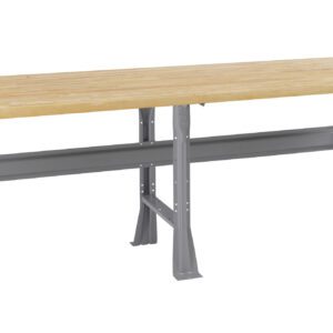 A long workbench with a light wood tabletop and sturdy gray metal legs. The design features a support beam running horizontally between the legs for additional stability. The table has a simple and industrial appearance.