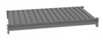 A gray metal shelf with a ribbed surface and hooks on each corner, designed for stacking or mounting. The shelf is shown at an angle, highlighting its rectangular shape and elongated grooves.