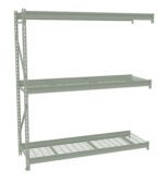 A metal shelving unit with three wire mesh shelves. The frame is light gray with a simple, industrial design, and its set against a plain white background.