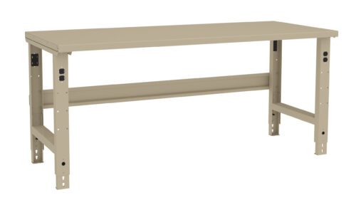 A beige, rectangular industrial workbench with adjustable legs and a flat tabletop. It features a sturdy design with a horizontal support bar beneath the tabletop and pre-drilled holes in the legs for height adjustment.