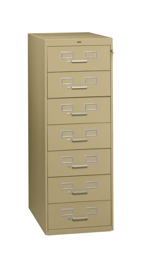 A beige, six-drawer filing cabinet with silver handles and label slots. The cabinet is upright and closed, with a keyhole on the top right. Its positioned against a plain white background.