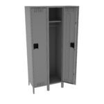 A grey metal locker with three compartments. The middle door is closed, while the right door is partially open, revealing a shelf and a hanging rod inside. The locker stands on short legs and has ventilation slots on the doors.