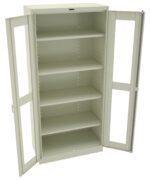 A beige metal storage cabinet with glass-paneled doors stands open, revealing four empty shelves inside. The cabinet is plain with a simple design suitable for organizing or storing items.