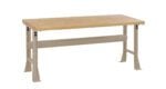 A wooden workbench with a light brown top and beige metal legs. The sturdy design includes adjustable height features and built-in braces for stability, suitable for workshops or garages.