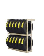 A metal storage rack holding two rows of new black tires, each with a yellow label. The rack is beige and neatly displays the tires against a plain white background.