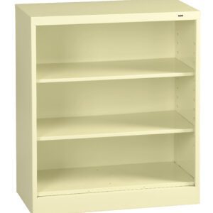 A beige metal bookcase with three shelves is shown. The design is simple and functional, featuring a solid back and an open front. The bookcase is empty, highlighting its spacious storage potential.