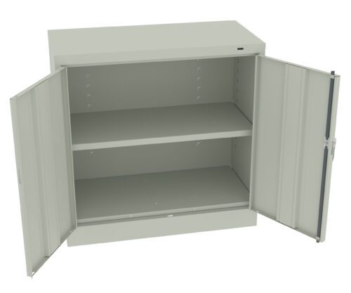 Open metal storage cabinet with two doors and an interior shelf. The cabinet is light gray, with adjustable shelving slots on the sides. The doors are wide open, revealing an empty interior. The cabinet has a plain, functional design.