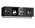 A black, wall-mounted sports equipment locker with three transparent compartments. The left holds a soccer ball, the middle is open, and the right contains a football.