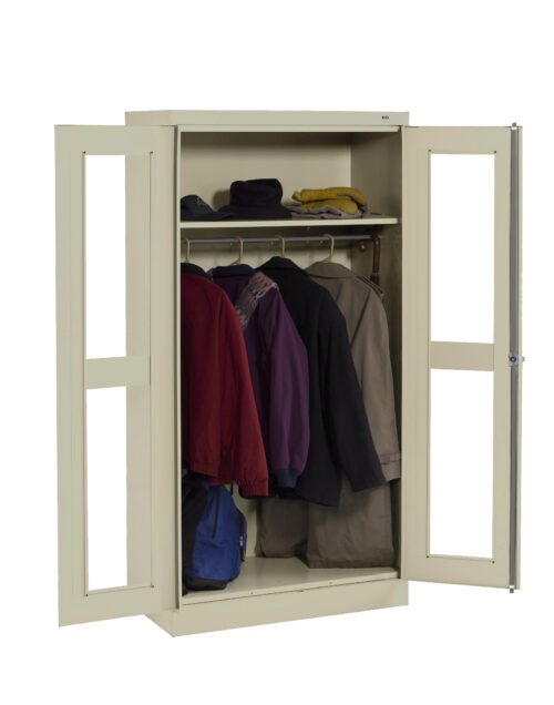 qfrbugiwcc9popw28tzp.jpg A beige metal wardrobe with open doors showing several coats and jackets hanging inside. There are also a few bags placed on the bottom shelf.