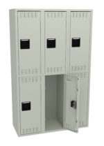 A metal locker unit with six compartments, arranged in two rows of three. The locker in the middle of the bottom row is open, showing its empty interior. The lockers are beige with black handles.