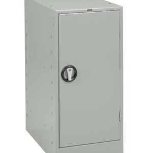 A gray metal locker with a single door is seen in the image. It has a black circular handle for opening and appears to be freestanding with a simple, unadorned design.