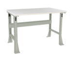 A metal workbench with a rectangular white tabletop and sturdy steel frame. It features a central supporting beam and adjustable legs for stability. The design is utilitarian and ideal for industrial or workshop settings.