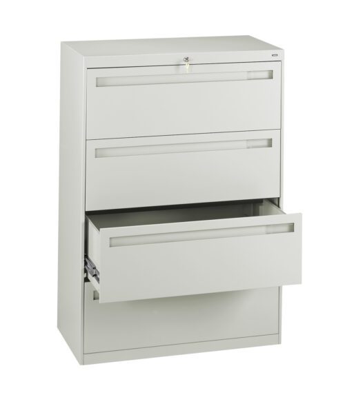 A beige, three-drawer filing cabinet with the bottom drawer open. It has a modern, minimalist design, and a lock at the top. The drawers have sleek horizontal handles.