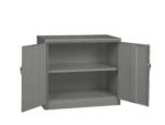 A grey metal cabinet with two open doors revealing an empty interior and one adjustable shelf, set against a plain white background.