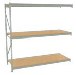 A metal shelving unit with three wooden shelves. The frame is light gray, and the shelves are evenly spaced. The top shelf is slightly shorter in length compared to the other two. The unit is empty and set against a plain background.
