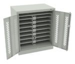 A gray metal cabinet with two open doors, revealing multiple shelves inside. Each shelf has slots with electrical outlets for charging devices. The cabinet features a lattice design on the doors for ventilation.