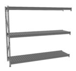 A gray metal shelf unit with three horizontal slatted shelves and a vertical support structure on the left side. The shelves are evenly spaced, and the overall design appears sturdy and industrial.