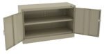 A grey metal storage cabinet with two open doors revealing two shelves. The cabinet is unadorned and has a clean, industrial appearance.