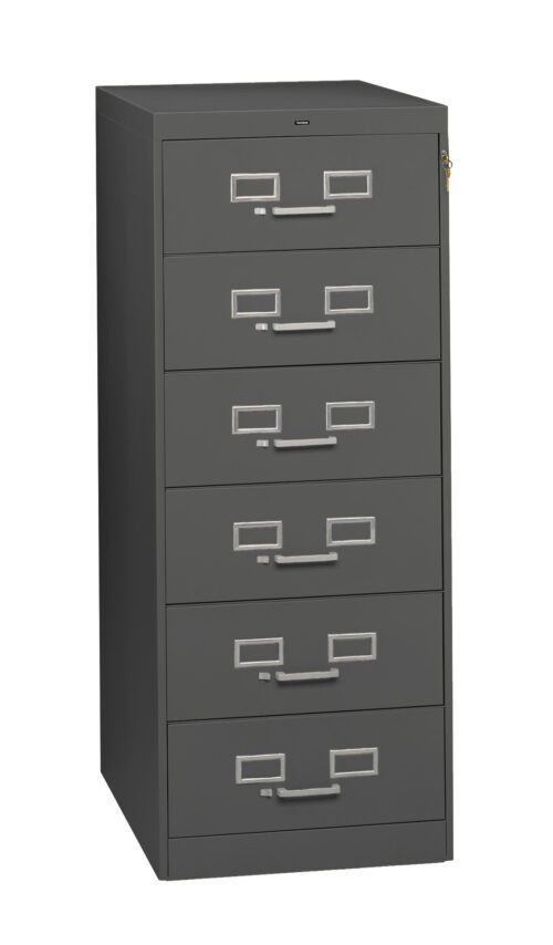 A tall, gray filing cabinet with six drawers. Each drawer has a silver handle and a label holder. The cabinet has a lock at the top right corner, providing secure storage, and stands on flat legs.