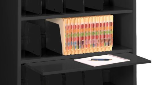 A black shelf containing a row of organized, color-coded file folders on the middle shelf. Below, a pull-out tray holds a notepad with a pen resting on top. The overall look is tidy and professional.