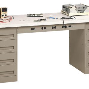 A beige workbench with six drawers on each side, featuring a digital multimeter, circuit boards, cables, and an open electronic device on the countertop.