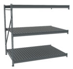 A large, empty, industrial metal shelving unit with three horizontal shelves and vertical supports, shown against a white background. The shelves are evenly spaced and designed for heavy-duty storage.