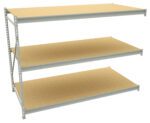 Three-tiered metal shelving unit with wooden shelves, viewed from an angle. The shelves are evenly spaced and supported by a metal frame. The design is industrial and practical, offering ample storage space.