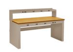 A workbench with a light brown top and a gray metal frame. It features an integrated shelf above the main work surface and multiple electrical outlets along the front edge and shelf.