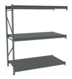 A metal shelving unit with three evenly spaced shelves. The unit is made of gray steel with a perforated design on the vertical supports. It is empty and designed for storage or organization in a warehouse or garage.