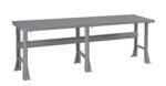 A long, gray metal workbench with a flat top and sturdy legs. The frame has crossbars for support. The design is simple, emphasizing functionality and stability.