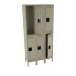A beige metal locker with five compartments, two stacked above three. Each compartment has a black handle. One lower compartment door is slightly open, revealing an empty interior. The locker stands on short legs.