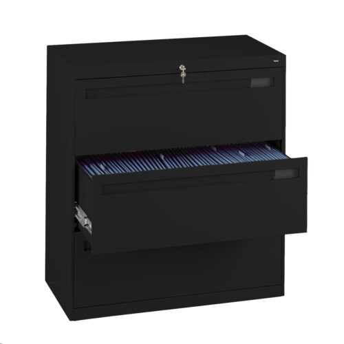 A black filing cabinet with three drawers, one of which is open and filled with hanging file folders. The top drawer has a visible key lock with a key inserted. The cabinet is positioned against a white background.