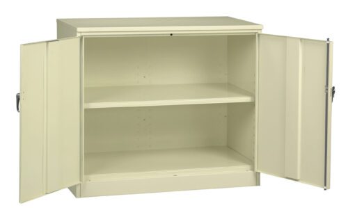A beige metal storage cabinet with two open doors revealing two shelves inside. The cabinet has a simple, industrial design, and is set against a plain white background.