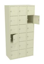 A beige metal locker unit with three columns and seven rows of small compartments. Several compartments are open, revealing empty storage spaces inside. Each compartment has a keyhole for locking.