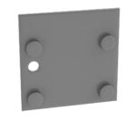 A gray, square metal plate with four round protrusions at each corner and a single circular hole near the left edge. The surface appears smooth and evenly colored.