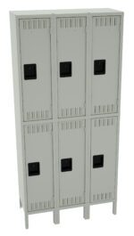 A gray metal locker unit with six compartments, arranged in two rows of three. Each locker has a black handle and ventilation slots. The unit stands on short legs.