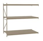 Three-tiered beige metal shelving unit with slatted shelves and side support brackets. The shelves are evenly spaced, providing ample storage space for various items. The design is minimalist and functional, suitable for industrial or garage use.