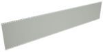 A long, blank film strip with perforated edges on both sides, viewed from an angle. The strip is light gray and is slightly tilted, giving a sense of depth.