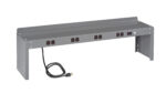 A gray, metal power strip with multiple outlets is mounted on a raised, rectangular frame. It features several circular sockets, a power switch, and a black electric cord with a plug extending from the side.
